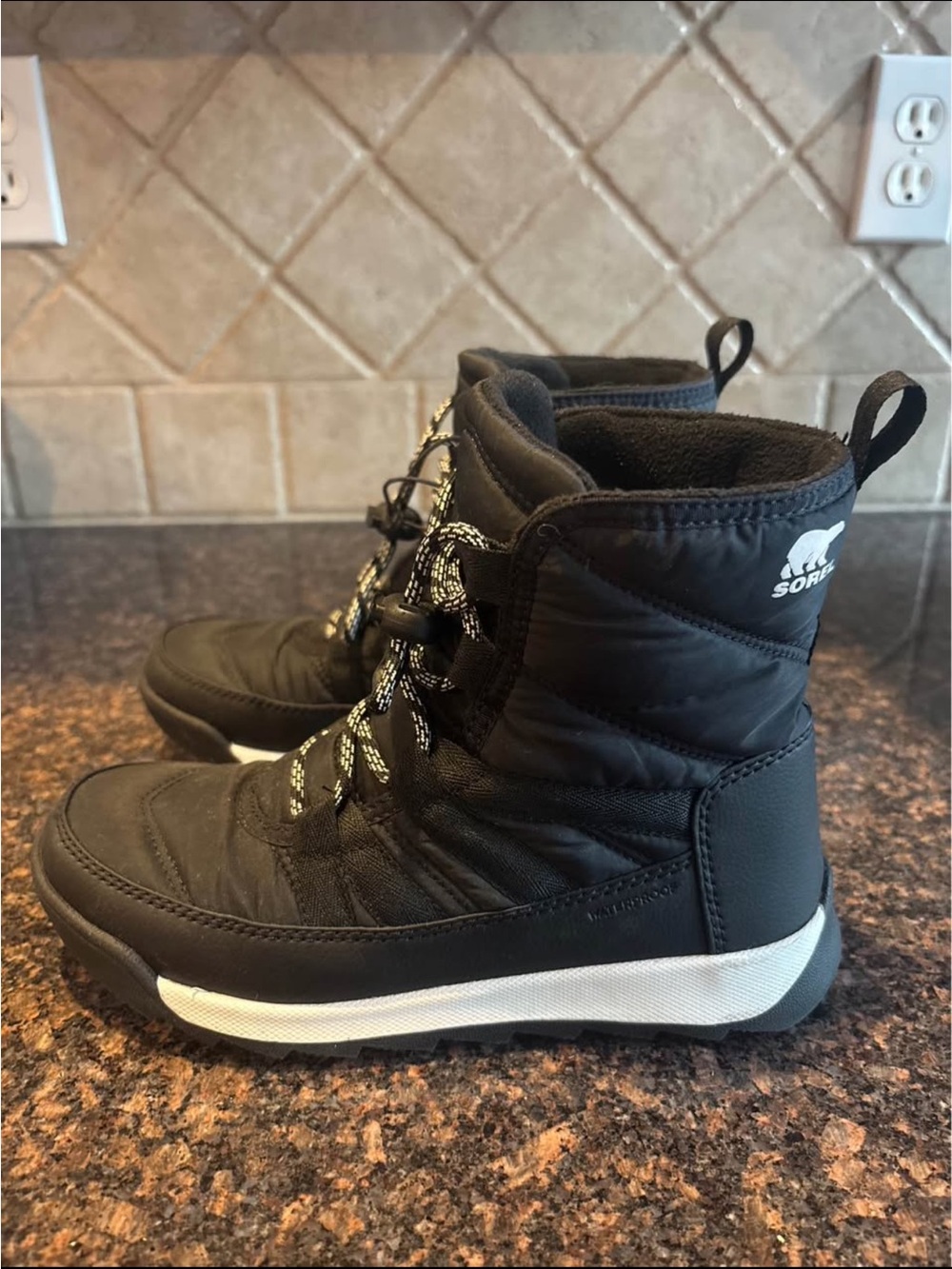 Sorel Kids Black Snow Boots with White Accent